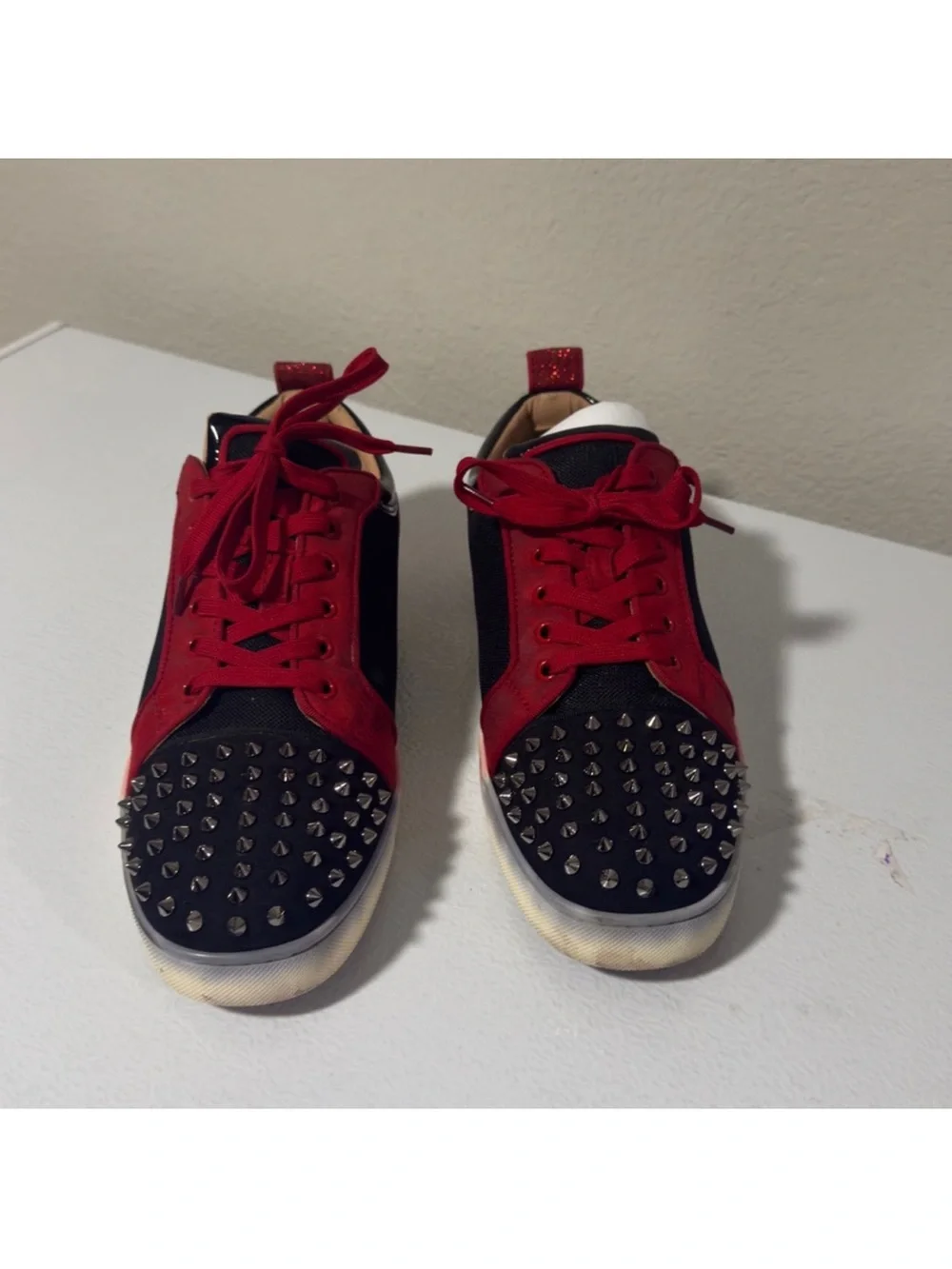Christian Louboutin Black and Red Spiked Low-Top Sneakers